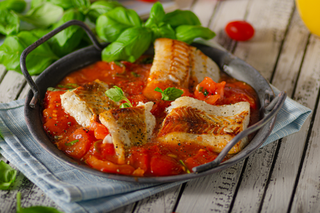 Roasted hake with tomato and basil sauce